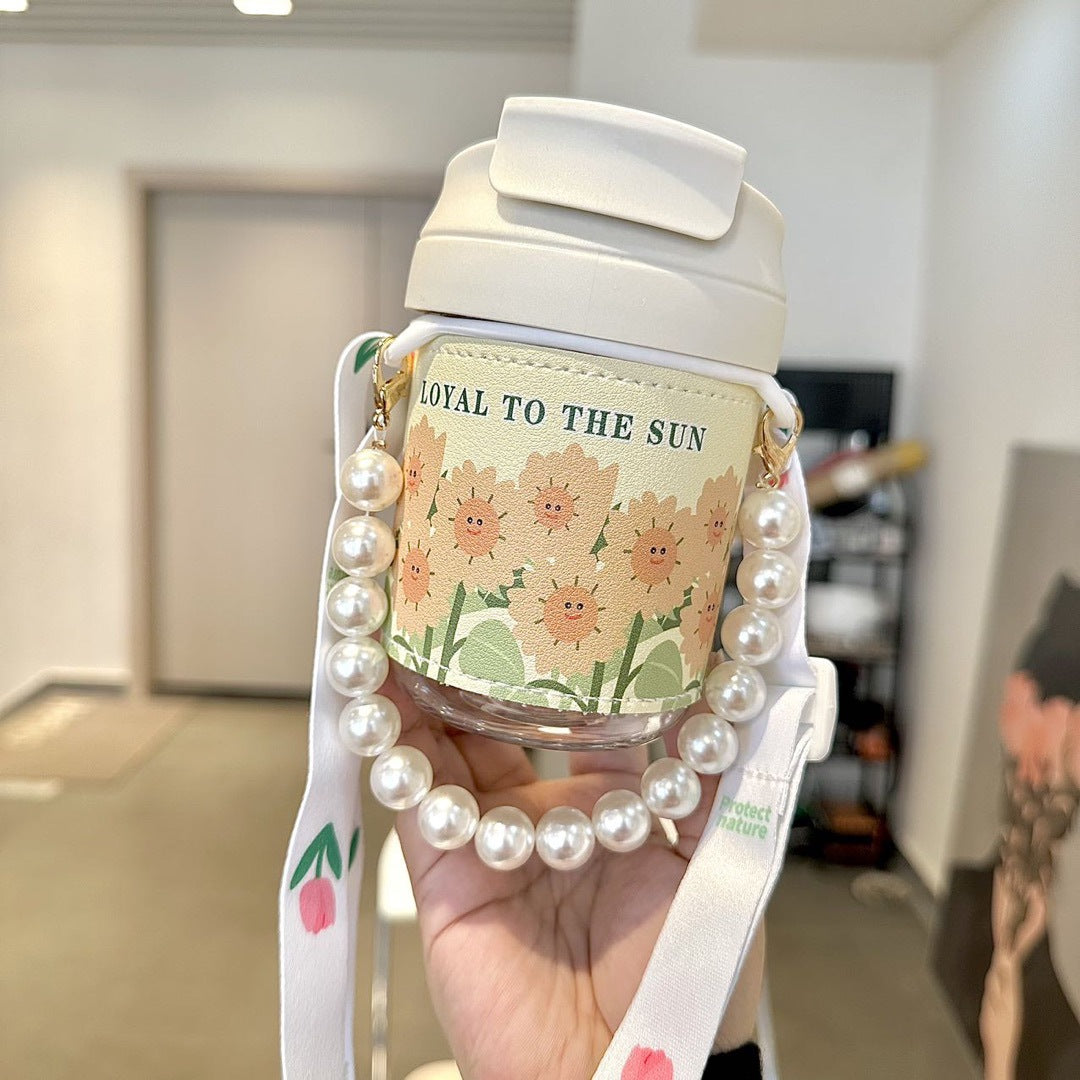 Women's insulated bottle with practical pearl carrying strap Bowlift
