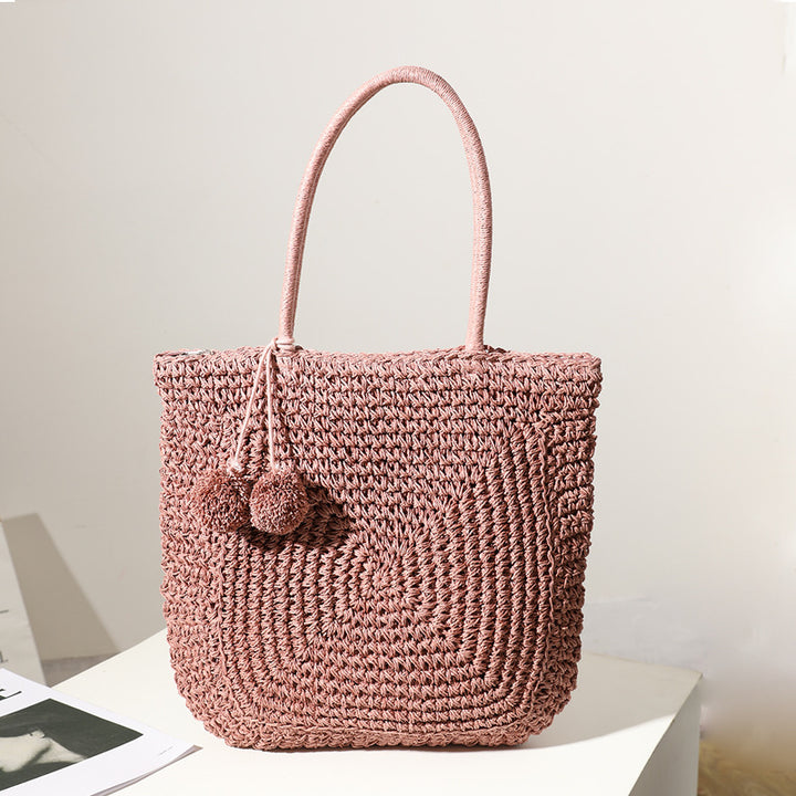 Handmade straw bag with pompom details Bowlift