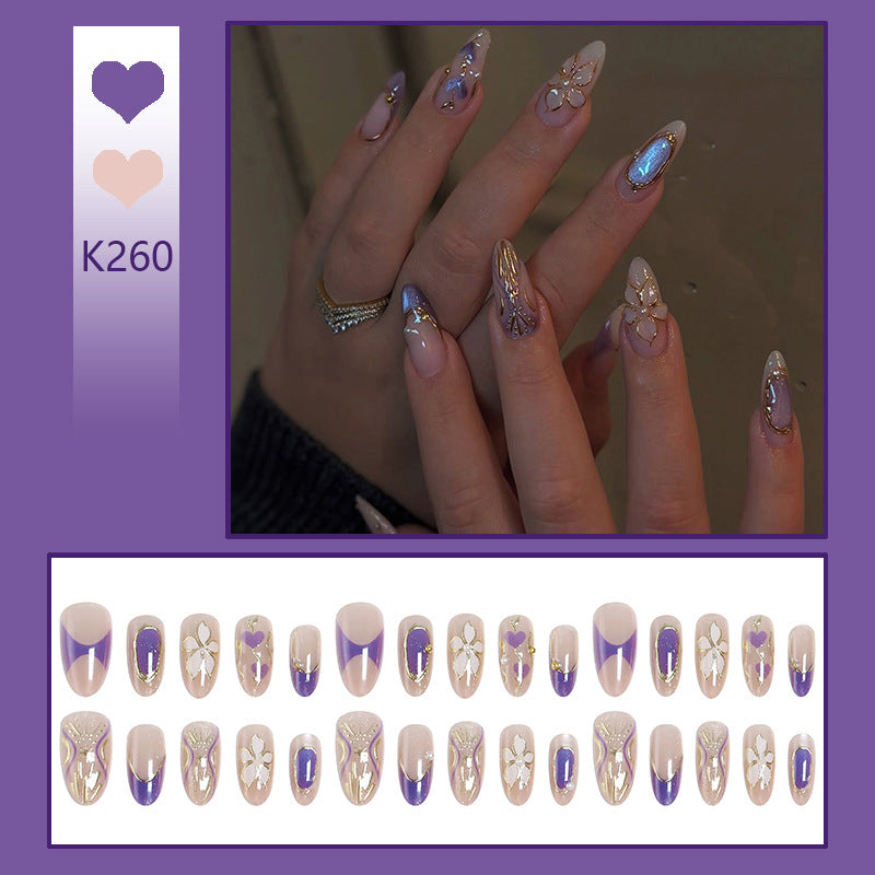 Artificial nail set with elegant flower and glitter details Bowlift