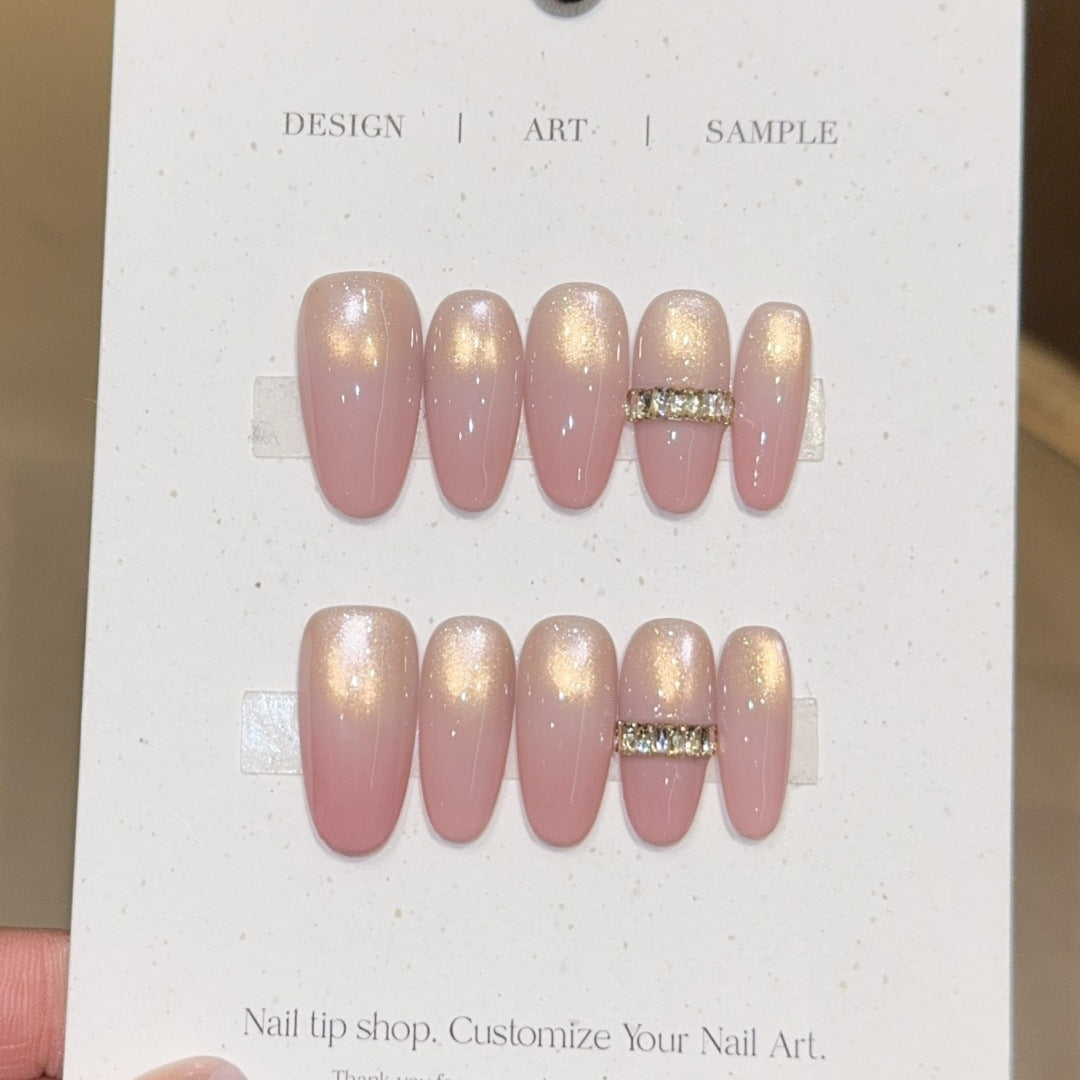 Glamorous artificial nails with elegant glitter and rhinestone application Bowlift