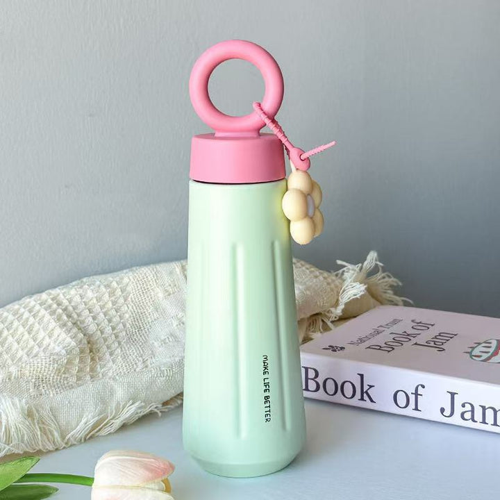 Ladies stylish water bottle with practical carry handle Bowlift