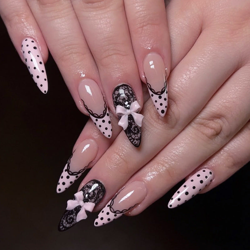 Elegant and artistic stiletto nails with tips and bows Bowlift