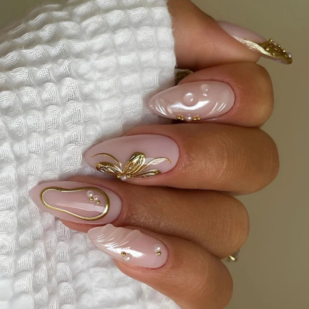 Elegant artificial nails with flower and glitter accents Bowlift