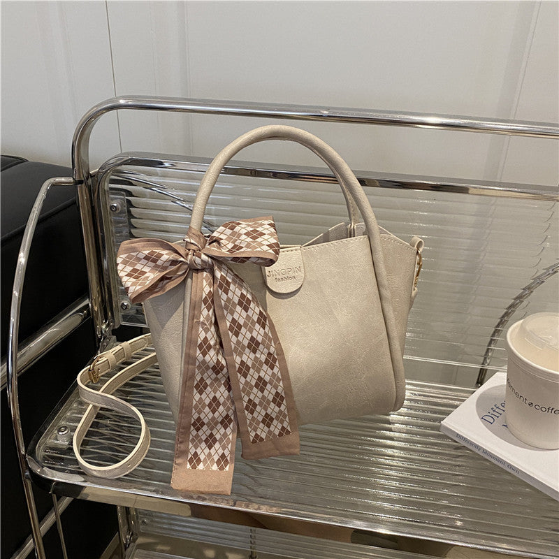 Elegant Bow Accent Handbag Bowlift