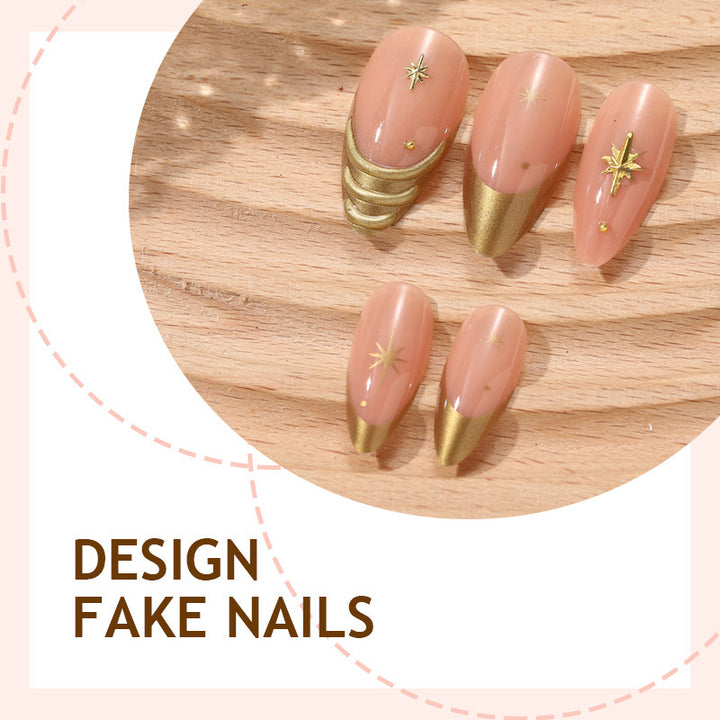Artificial nail set with elegant golden accents and sparkling stars Bowlift