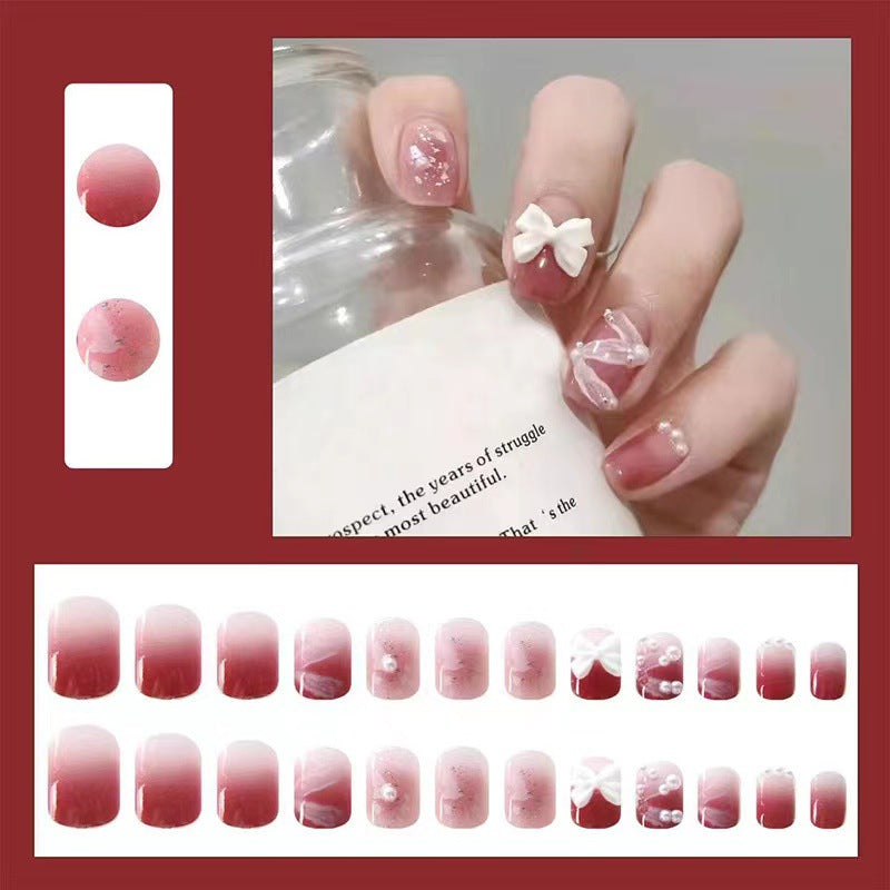 Creative art nails with bows and pearl coating Bowlift