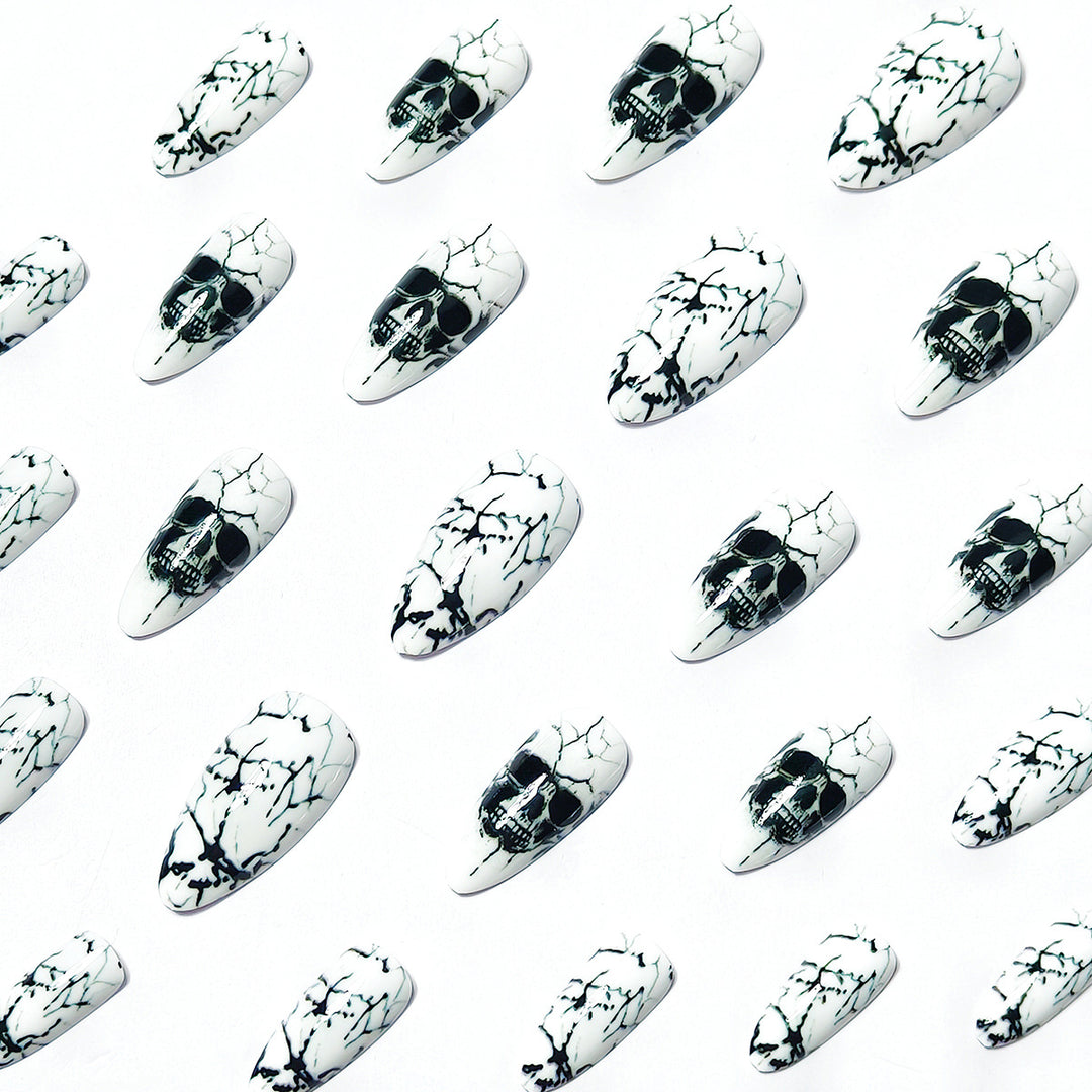 Artificial nails with playful skull design and crackle effects Bowlift