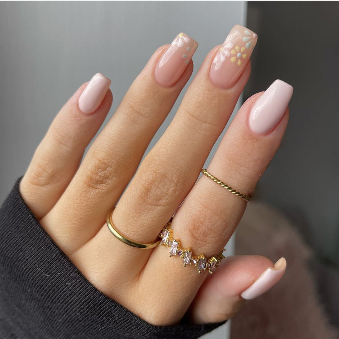 Artful nail extensions with floral decorations Bowlift