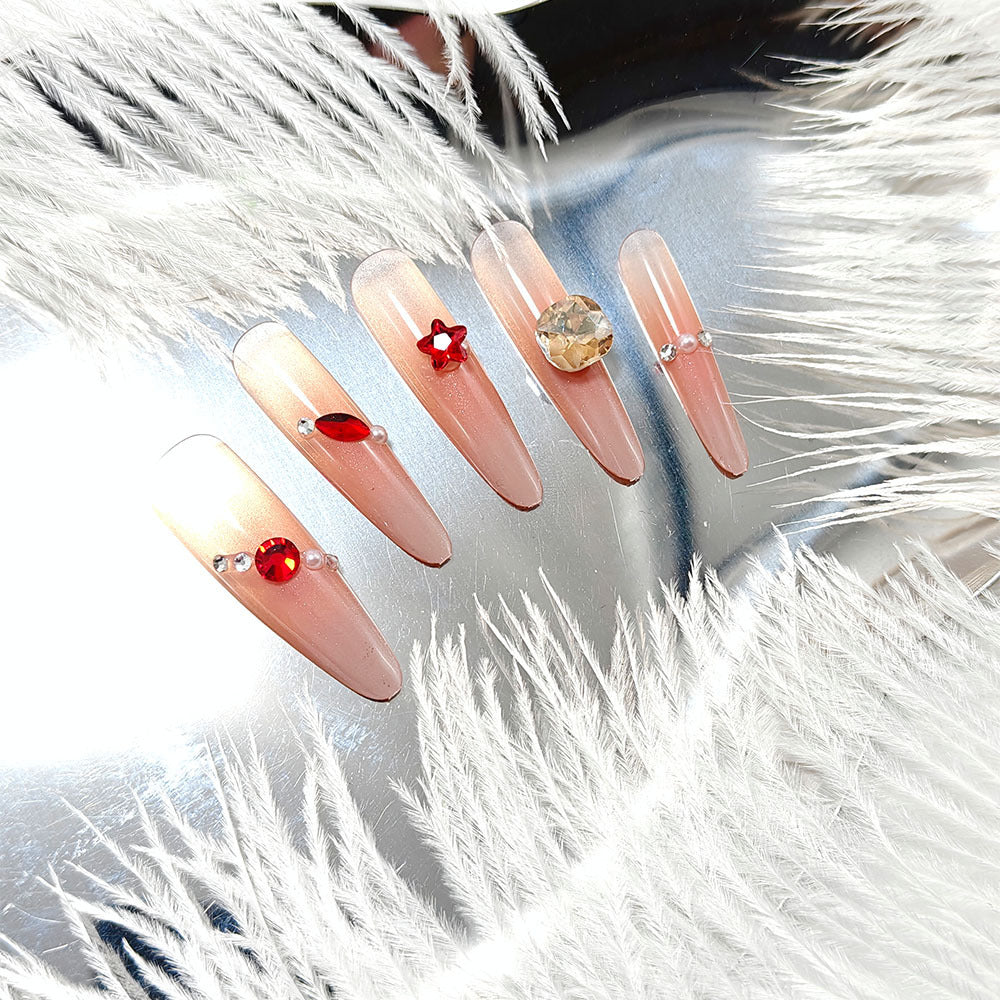 Artificial nails with glamorous decorations Bowlift