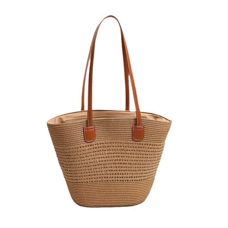 Elegant Bast bag with leather accents Bowlift