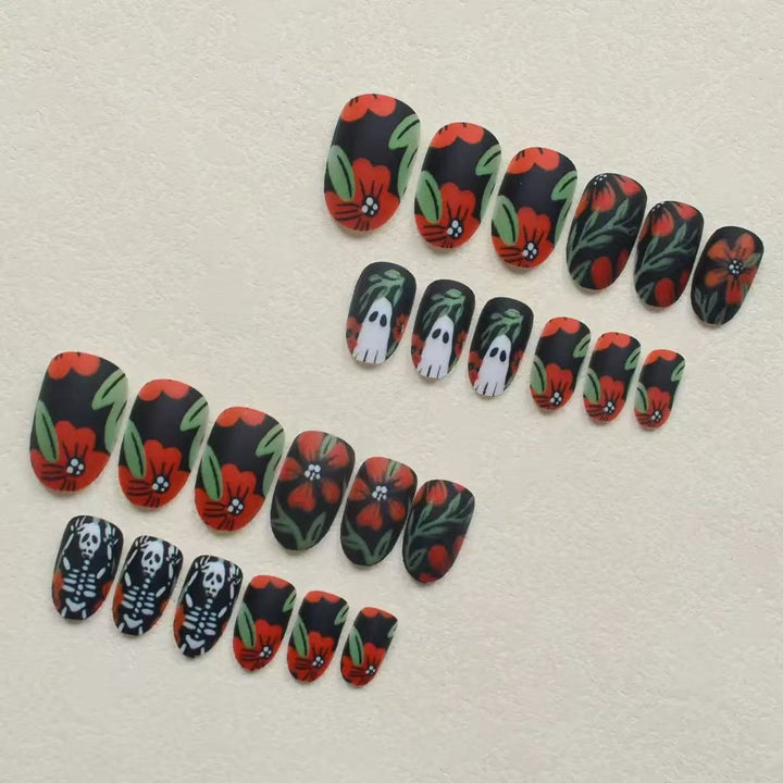 Acrylic nail set with creepy Halloween designs and floral accents Bowlift