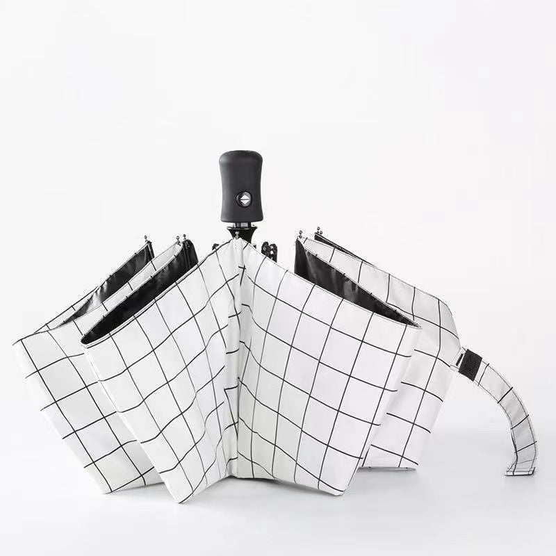 Compact Manual Eight-Rib Windproof Folding Umbrella with UV Protection and Grid Print Bowlift