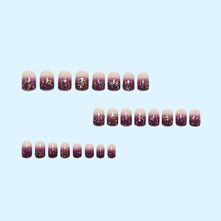 Artificial nails with glitter gradient and colorful accent Bowlift