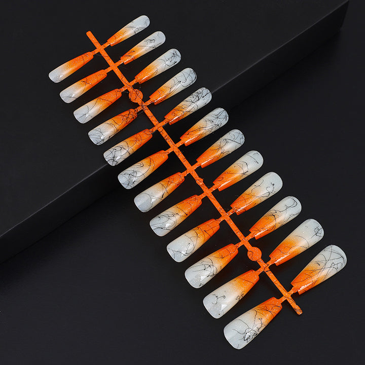 Artificial nails in modern ombre design with marbled accents Bowlift