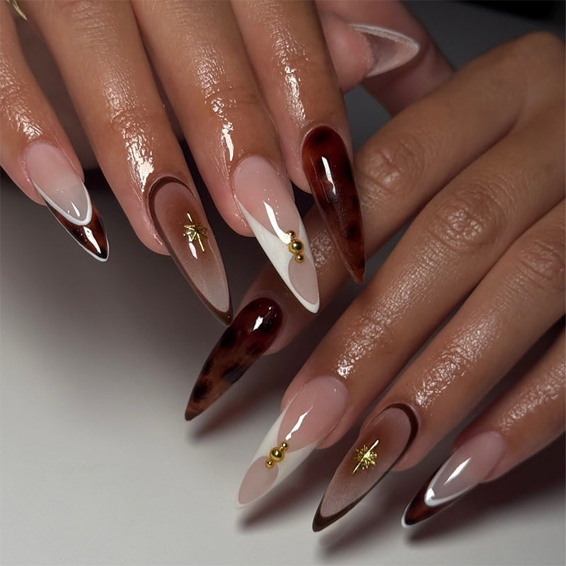 Artistic Press-On Nail Set with Unique Tortoiseshell and Subtle Floral Designs Bowlift