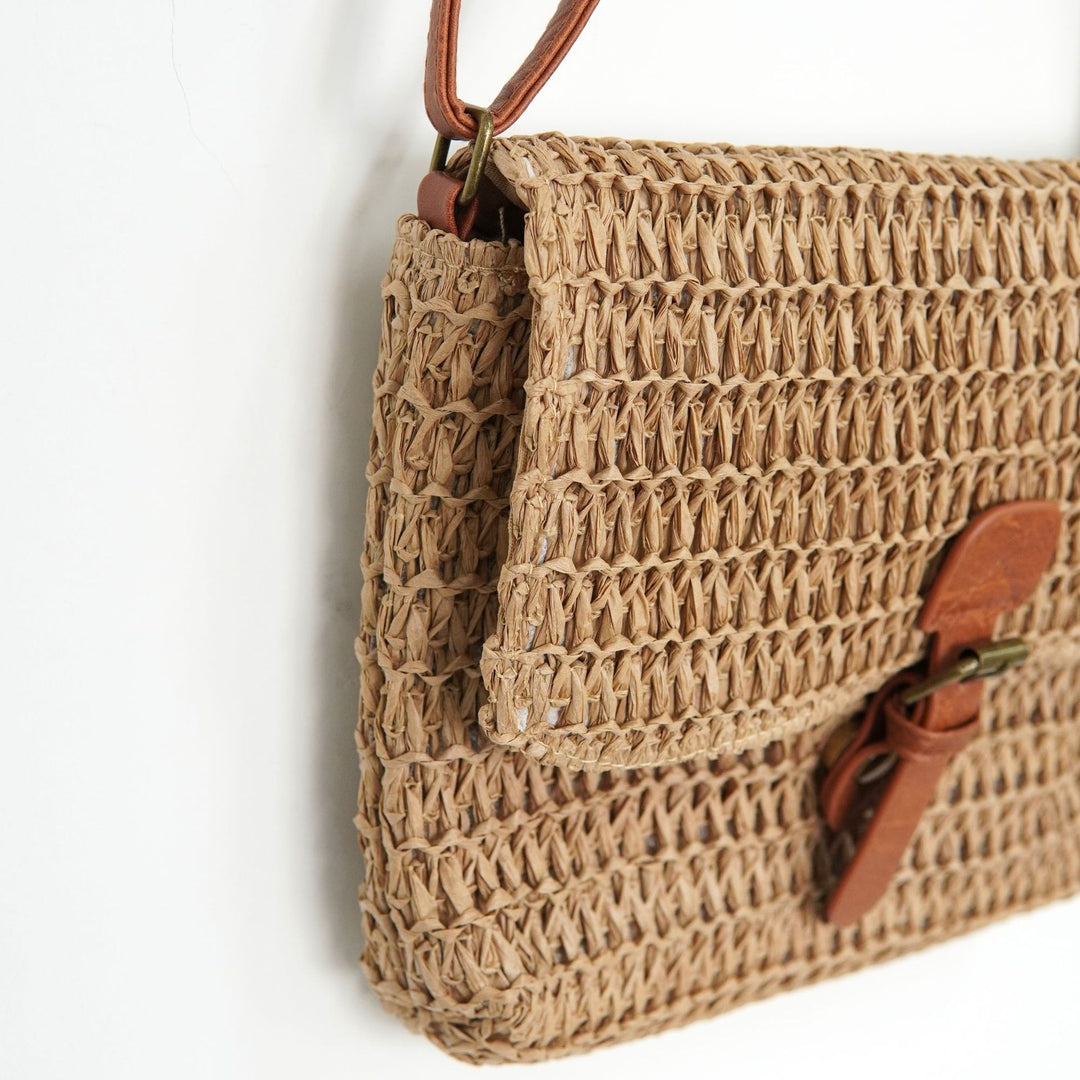Shoulder bag made of woven natural material with adjustable leather shoulder strap Bowlift