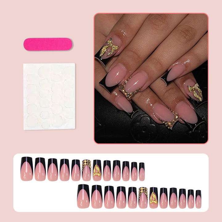 Artificial nail set with elegant gold decoration and stylish black Bowlift