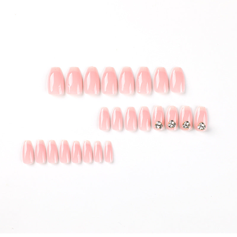 Artful nail extensions with elegant French tip and rhinestone embellishments Bowlift