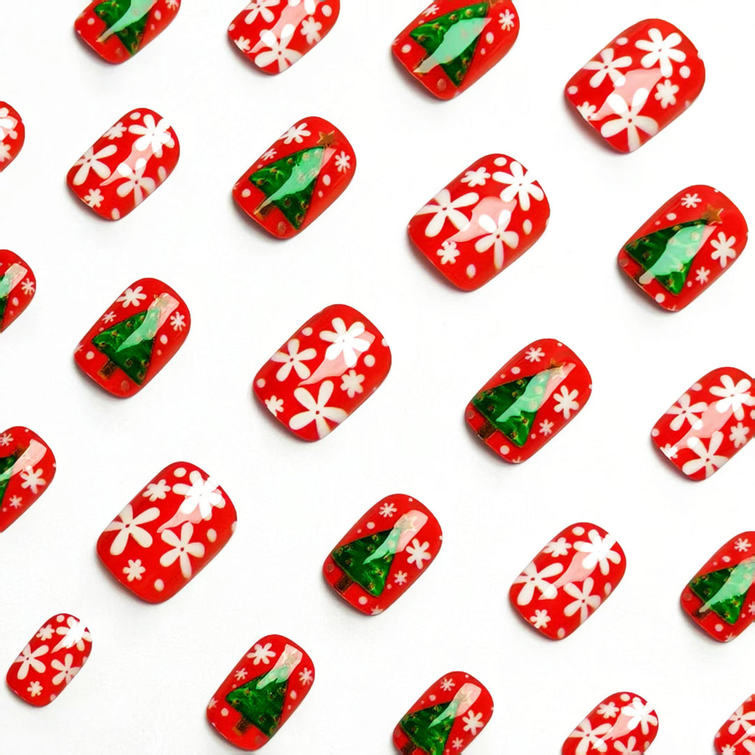 Artificial nails with festive Christmas tree design Bowlift