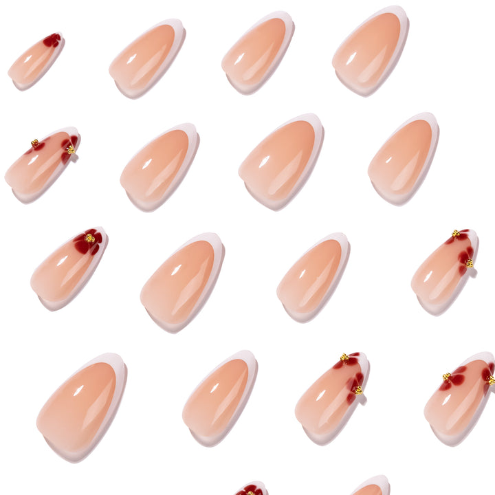 Artistic stiletto nails with luxurious floral design Bowlift
