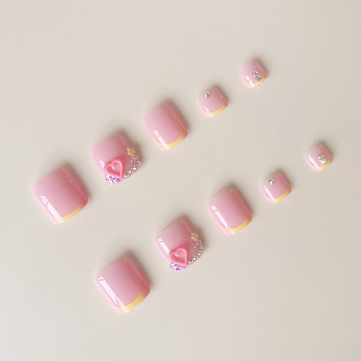 Artificial nail set with playful 3D design and sparkling accents Bowlift