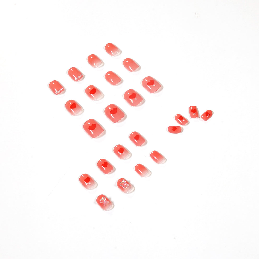 Artful nail art with radiant shine and heart motifs Bowlift