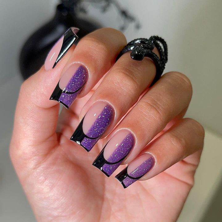 Artful nail extensions with glamorous color gradient and glitter details Bowlift