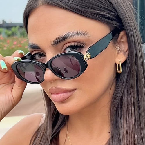 Women elegant sunglasses with stylish contours Bowlift
