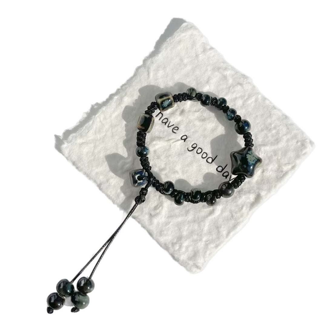 Adjustable Star and Bead Charm Bracelet Bowlift