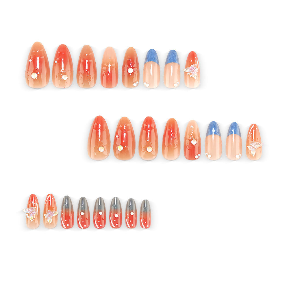 Artful nail art with pearls and butterfly details Bowlift