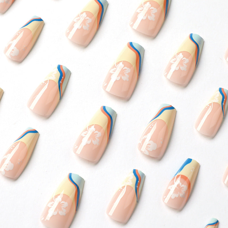 Artistic nail art with floral accents and creative color layers Bowlift