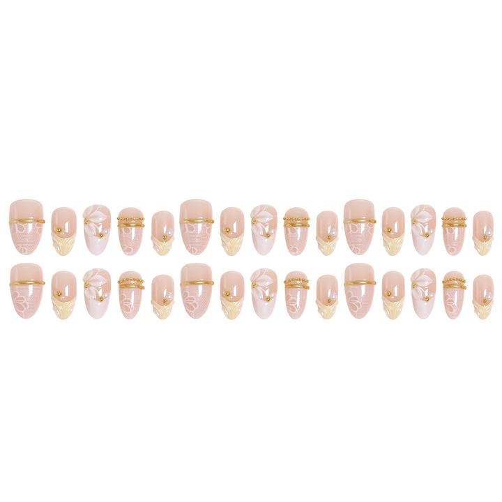 Artificial nail set with enchanting floral details and luxurious gold accents Bowlift