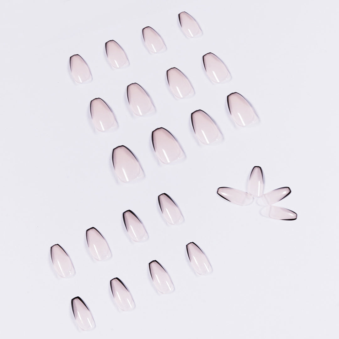 Artful stiletto nails with elegant black tip decoration Bowlift