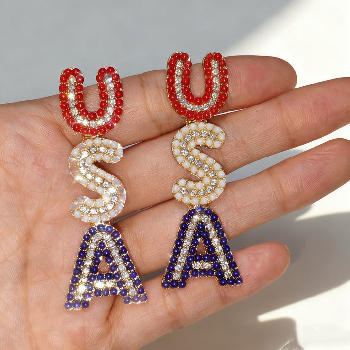 Women’s sparkling statement earrings with crystal beads and gold-plated setting Bowlift