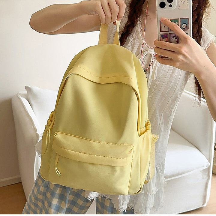 Leisure backpack with flexible side pockets and clear structure Bowlift