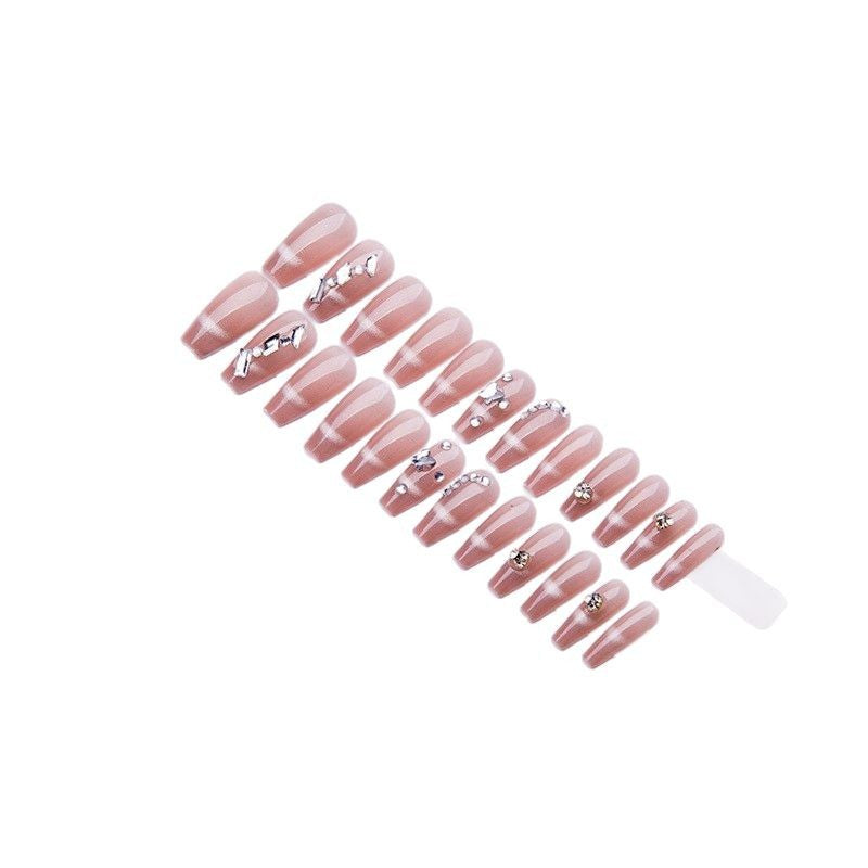 Elegant artificial nails with sparkling gold accents Bowlift