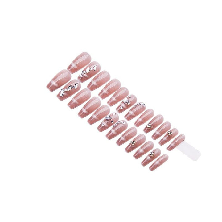 Elegant artificial nails with sparkling gold accents Bowlift