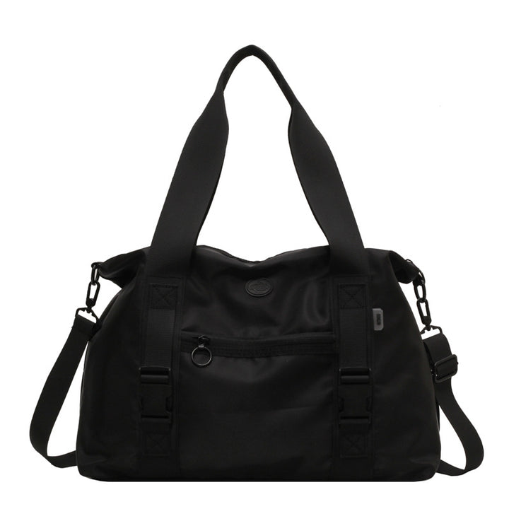 Spacious sports duffel bag with ergonomic carrying handles and water-repellent material Bowlift