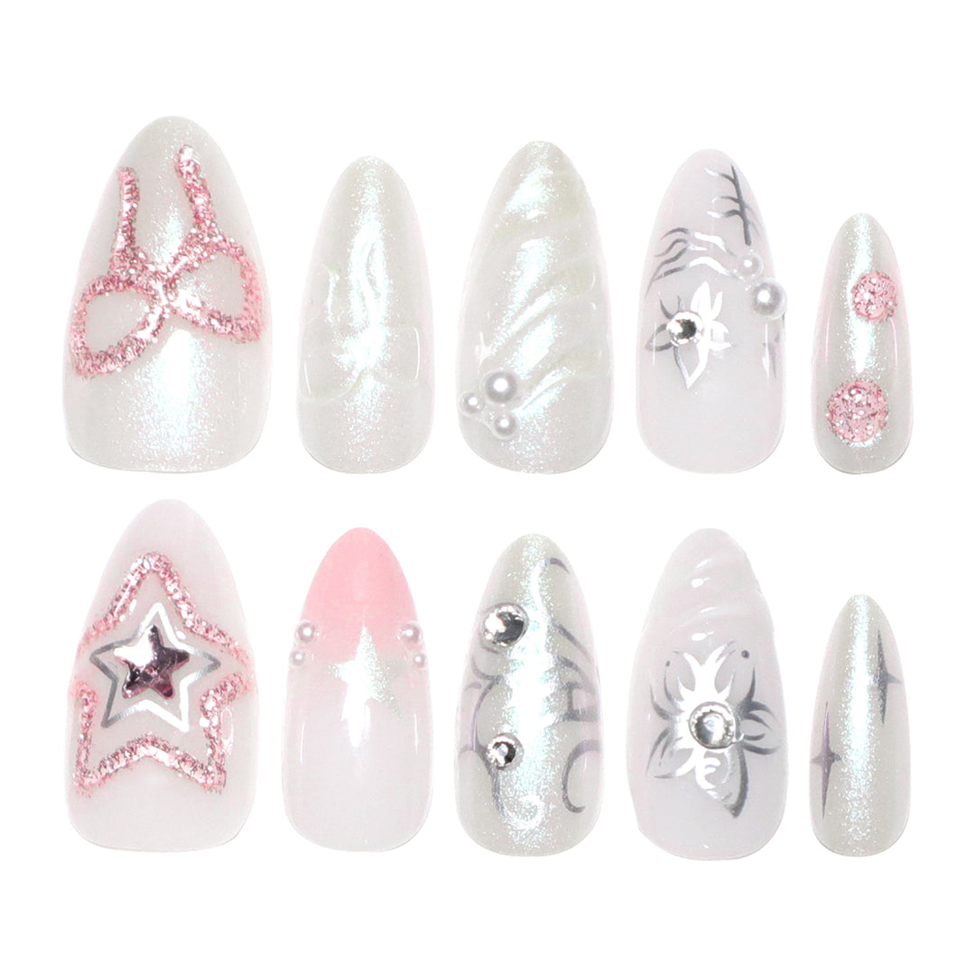 Artistic nail extensions with shiny embellishments Bowlift