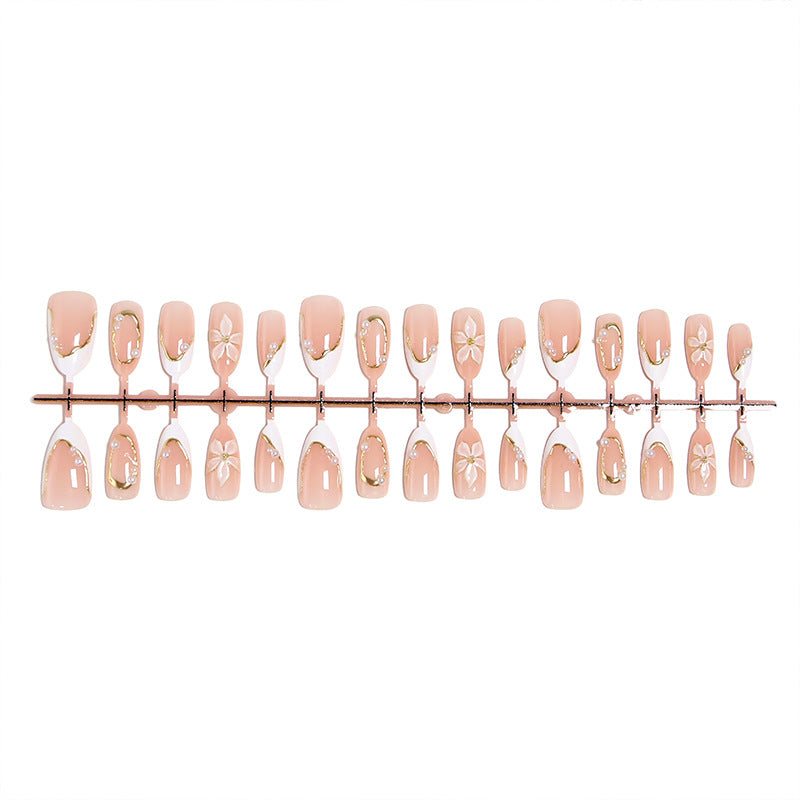 Artificial nail set with elegant floral design and glamorous 3D applications Bowlift