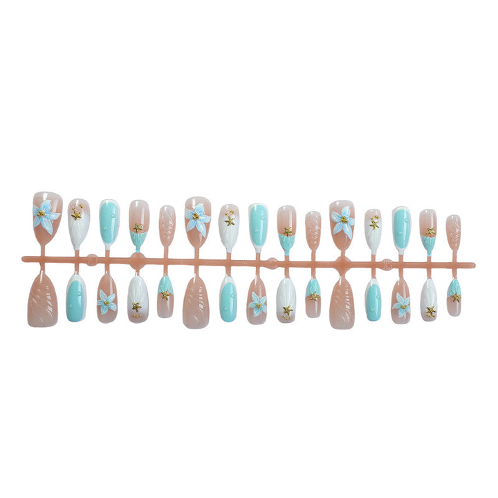 Artificial nail set with floral design and artistic embellishments Bowlift