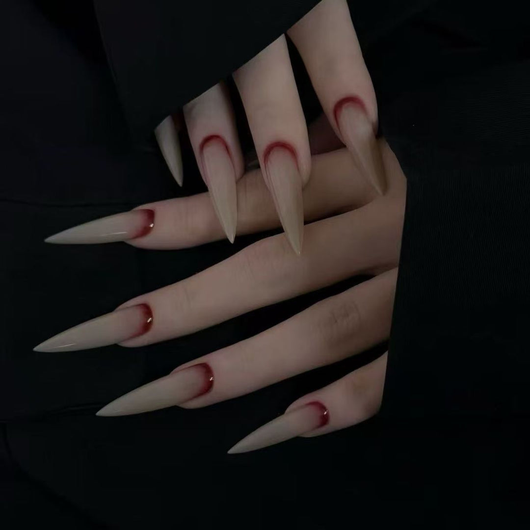 Artistic Long Stiletto Nail Enhancements Bowlift
