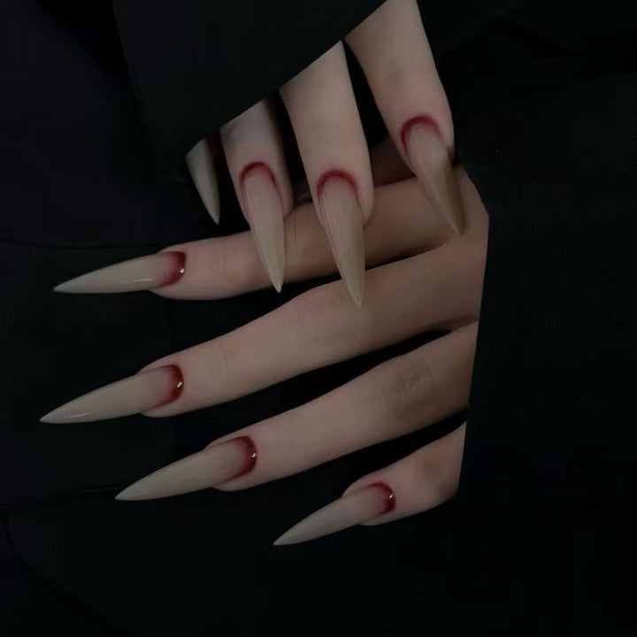 Artistic Long Stiletto Nail Enhancements Bowlift