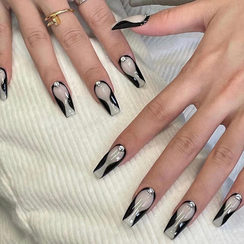 Artistic nail extensions with elegant accents Bowlift