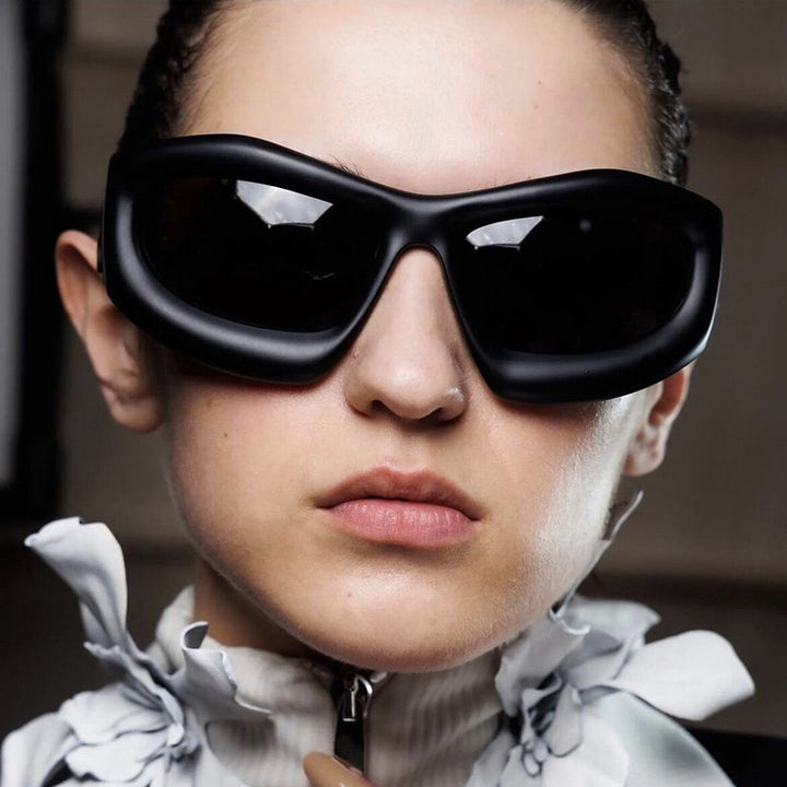 Women's sporty sunglasses with protective UV filter and thick frame Bowlift
