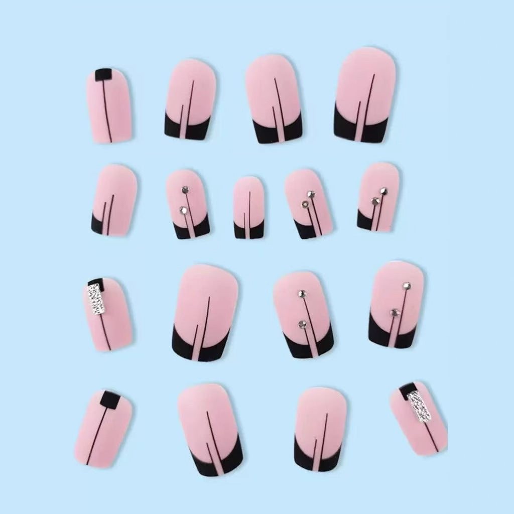 Acrylic nail set with elegant rhinestone accents and stylish lines Bowlift