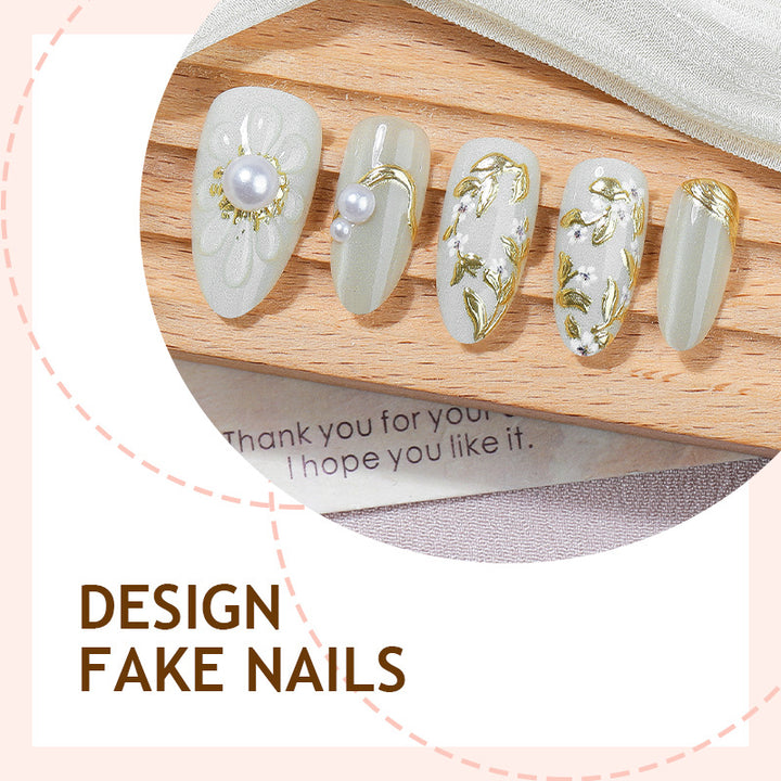Artificial nail set with elegant flower and pearl decorations Bowlift