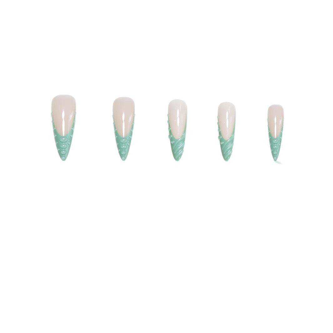 Artistic Stiletto Press-On Nail Design with 3D Shell Accents Bowlift