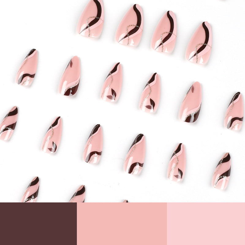 Artistic Nail Decoration with Gold Accents Bowlift