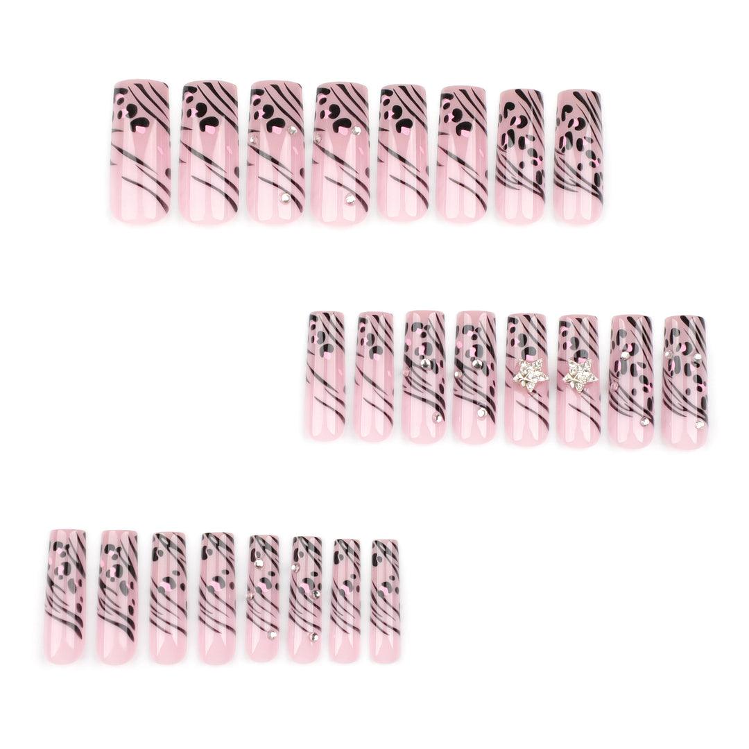 Artful Nail Art with Zebra Pattern and Glitter Accents Bowlift
